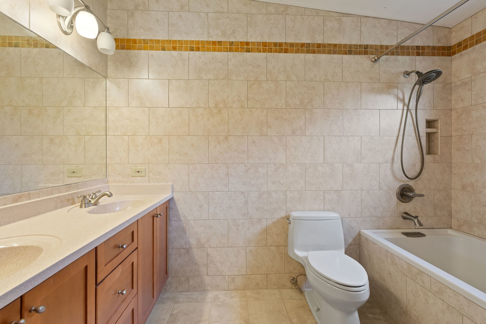 2819 Meyers Road Oak Brook, IL 60523 - Photo 19 of 35 a bathroom with a sink a toilet and shower
