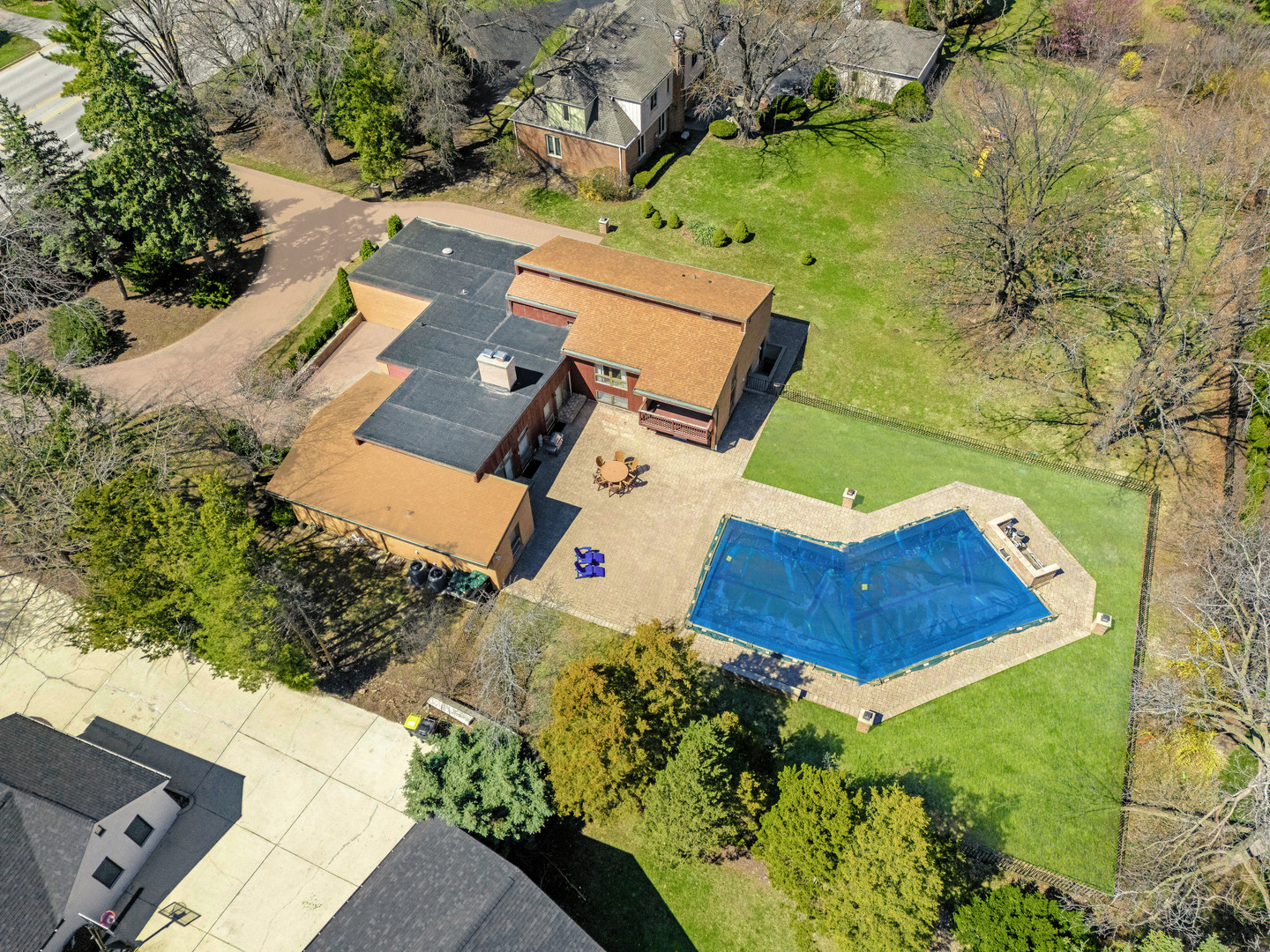 2819 Meyers Road Oak Brook, IL 60523 - Photo 2 of 35 an aerial view of a house with a yard and lake view