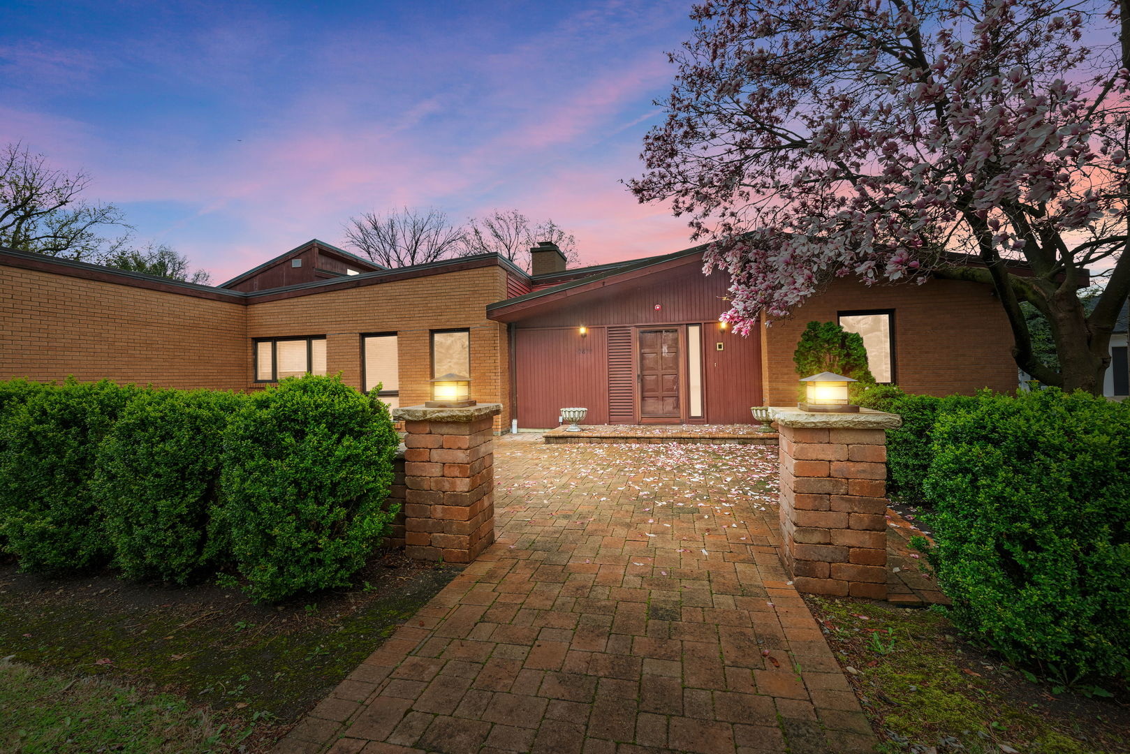 2819 Meyers Road Oak Brook, IL 60523 - Photo 4 of 35 a front view of a house with garden