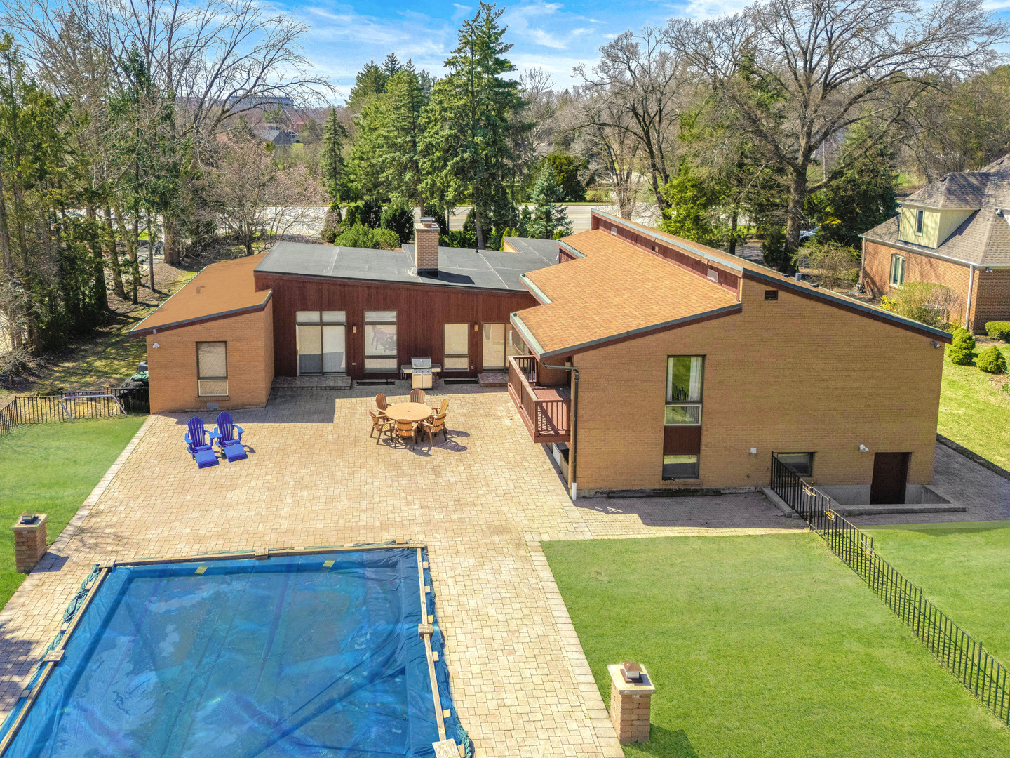 2819 Meyers Road Oak Brook, IL 60523 - Photo 9 of 35 a view of a house with pool and chairs