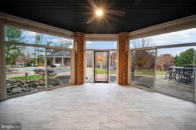 a view of a porch with wooden floor