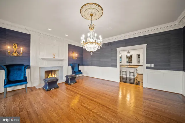 an aerial view of a house with a garden and swimming pool