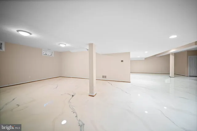 a close up of a sink and a mirror