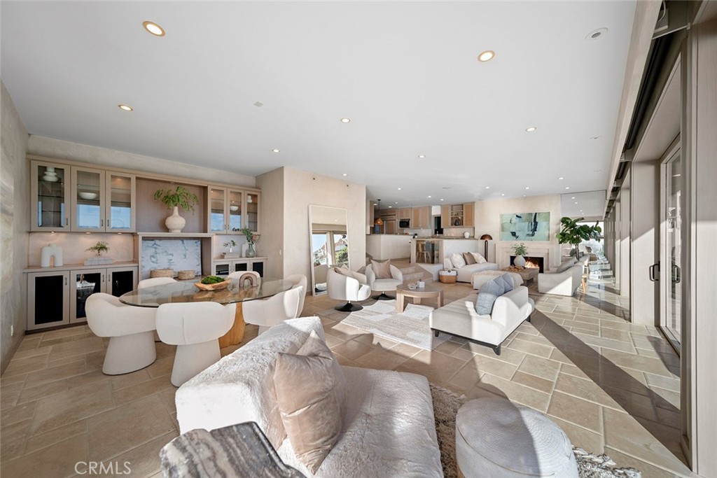 1907 Ocean Way Laguna Beach, CA 92651 - Photo 42 of 74 a living room with lots of white furniture and a rug