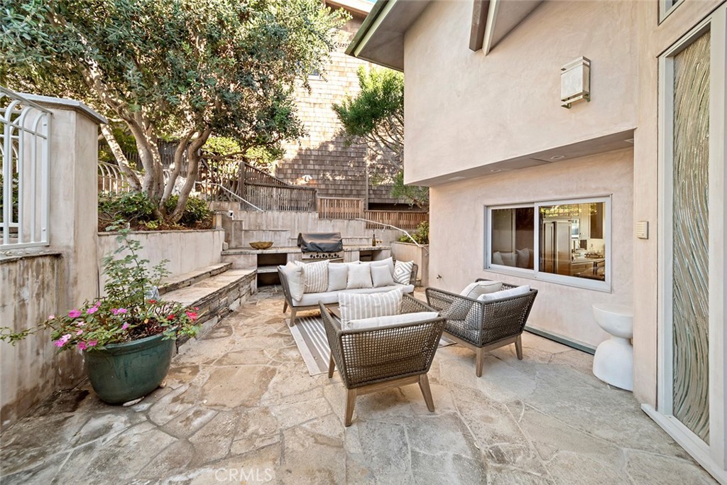 1907 Ocean Way Laguna Beach, CA 92651 - Photo 44 of 74 a building outdoor space with patio furniture and potted plants
