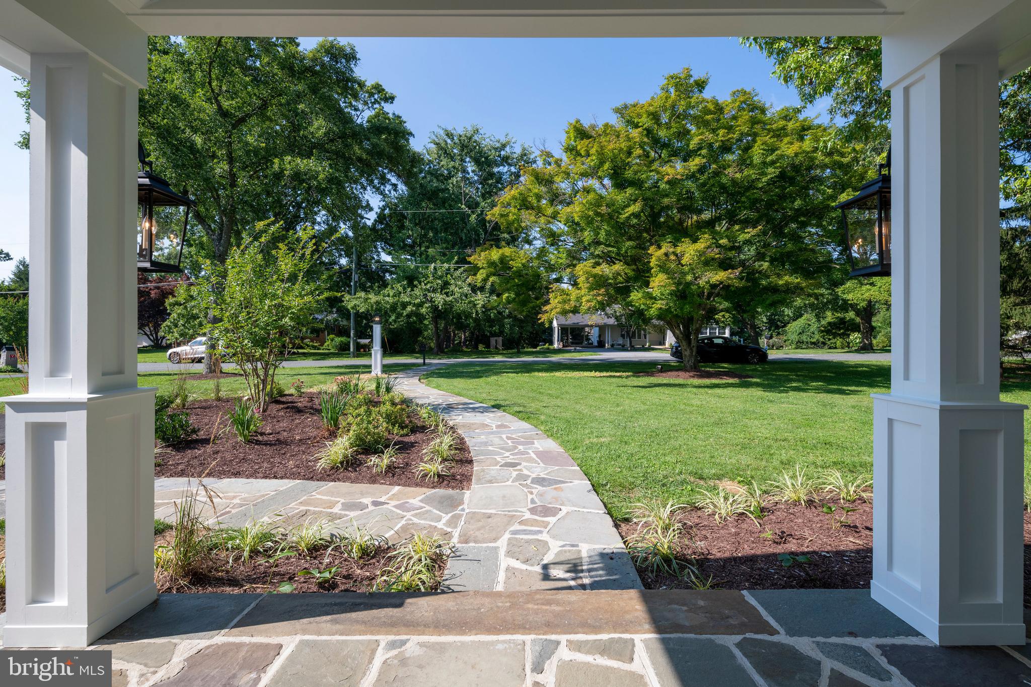 705 Chapel Ridge Road Lutherville-Timonium, MD 21093 - Photo 2 of 59 Stone Hardscape & Wide Portico Frame the Entrance