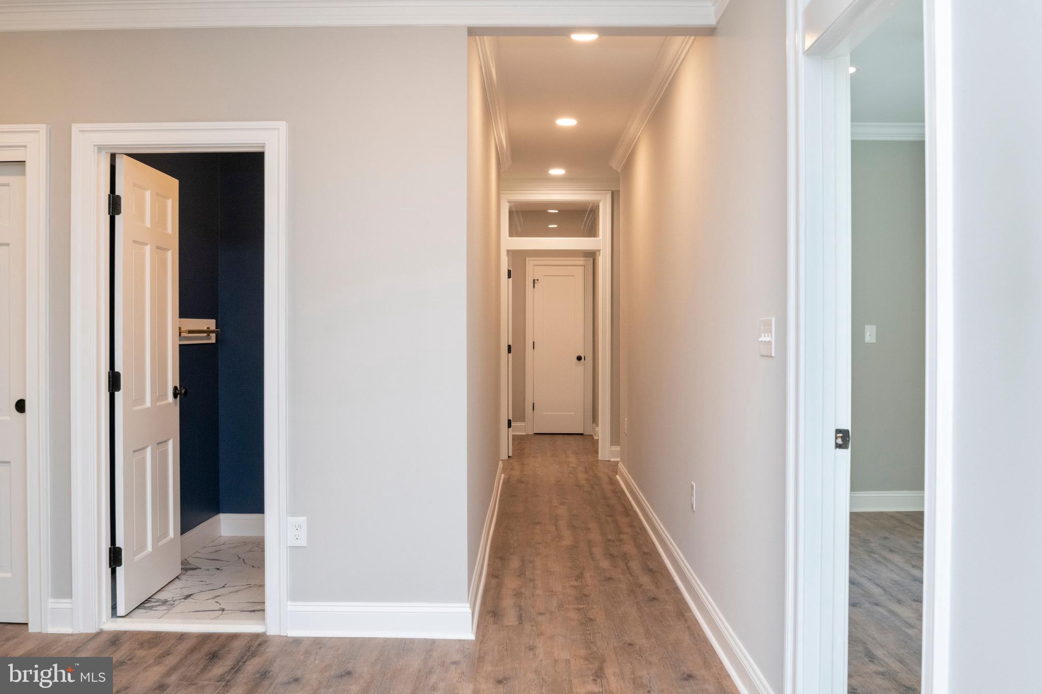 705 Chapel Ridge Road Lutherville-Timonium, MD 21093 - Photo 23 of 59 High Ceilinged Hallway to Sleeping Wing