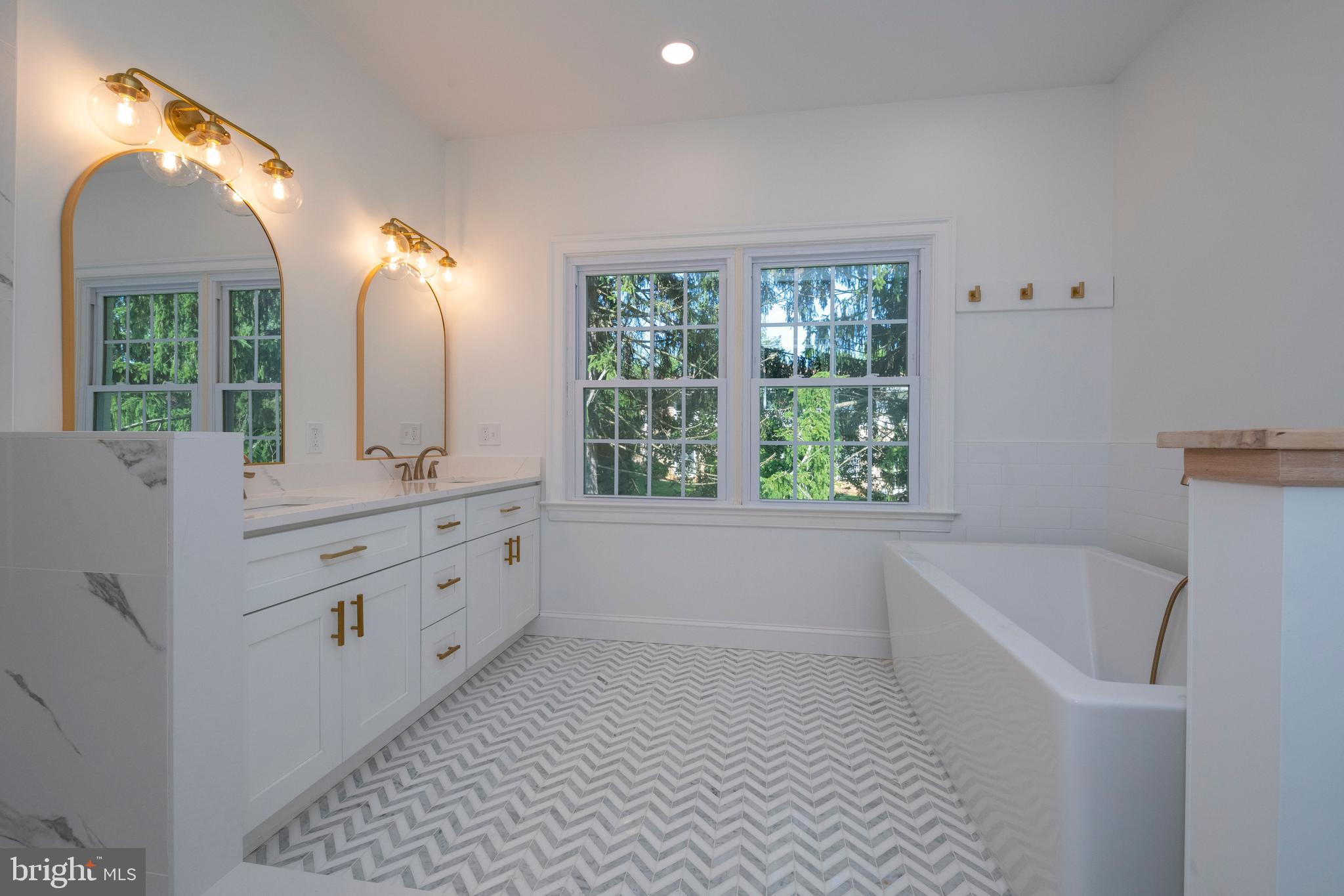 705 Chapel Ridge Road Lutherville-Timonium, MD 21093 - Photo 32 of 59 Luxurious Soaking Tub, Double Vanity, Marble Floor