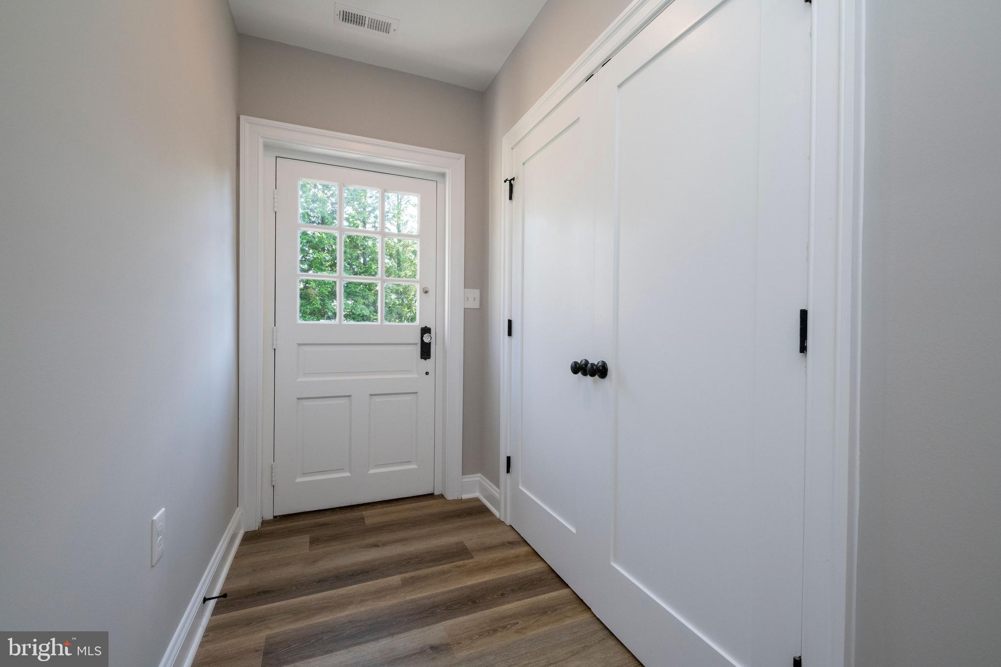 705 Chapel Ridge Road Lutherville-Timonium, MD 21093 - Photo 51 of 59 LL Entrance & doors to 2nd Laundry Rm Space