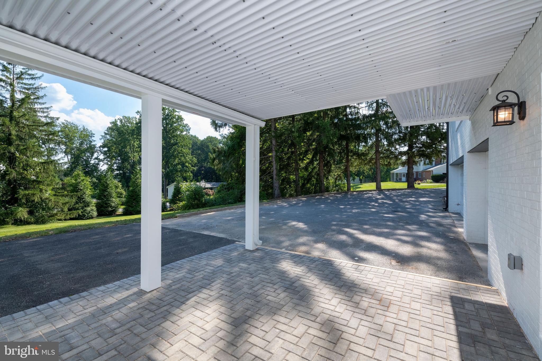 705 Chapel Ridge Road Lutherville-Timonium, MD 21093 - Photo 54 of 59 Paver Patio Outside LL Slider