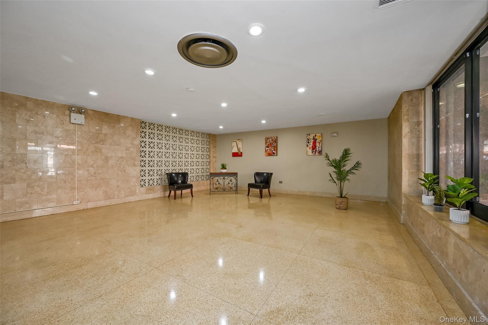 99-10 60th Avenue, Unit 3B Queens, NY 11368 - Photo 18 of 25 a view of a room with gym equipment