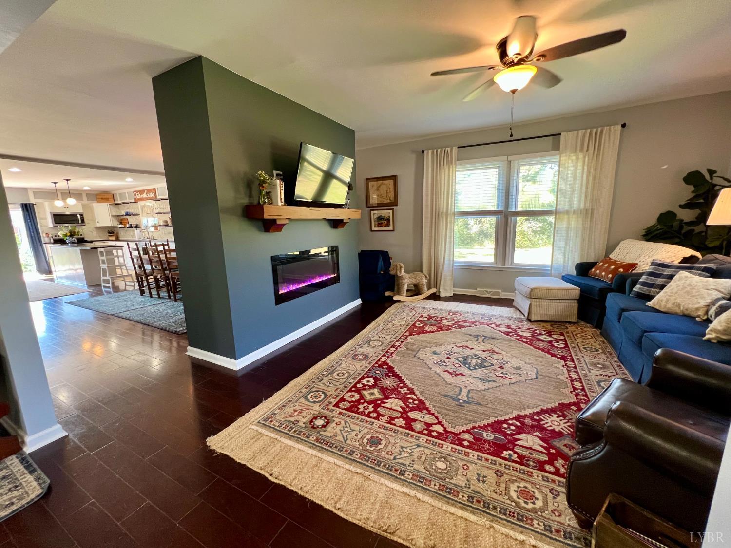 120 North Main Street Amherst, VA 24521 - Photo 12 of 62 a bed sitting in a bedroom next to a window