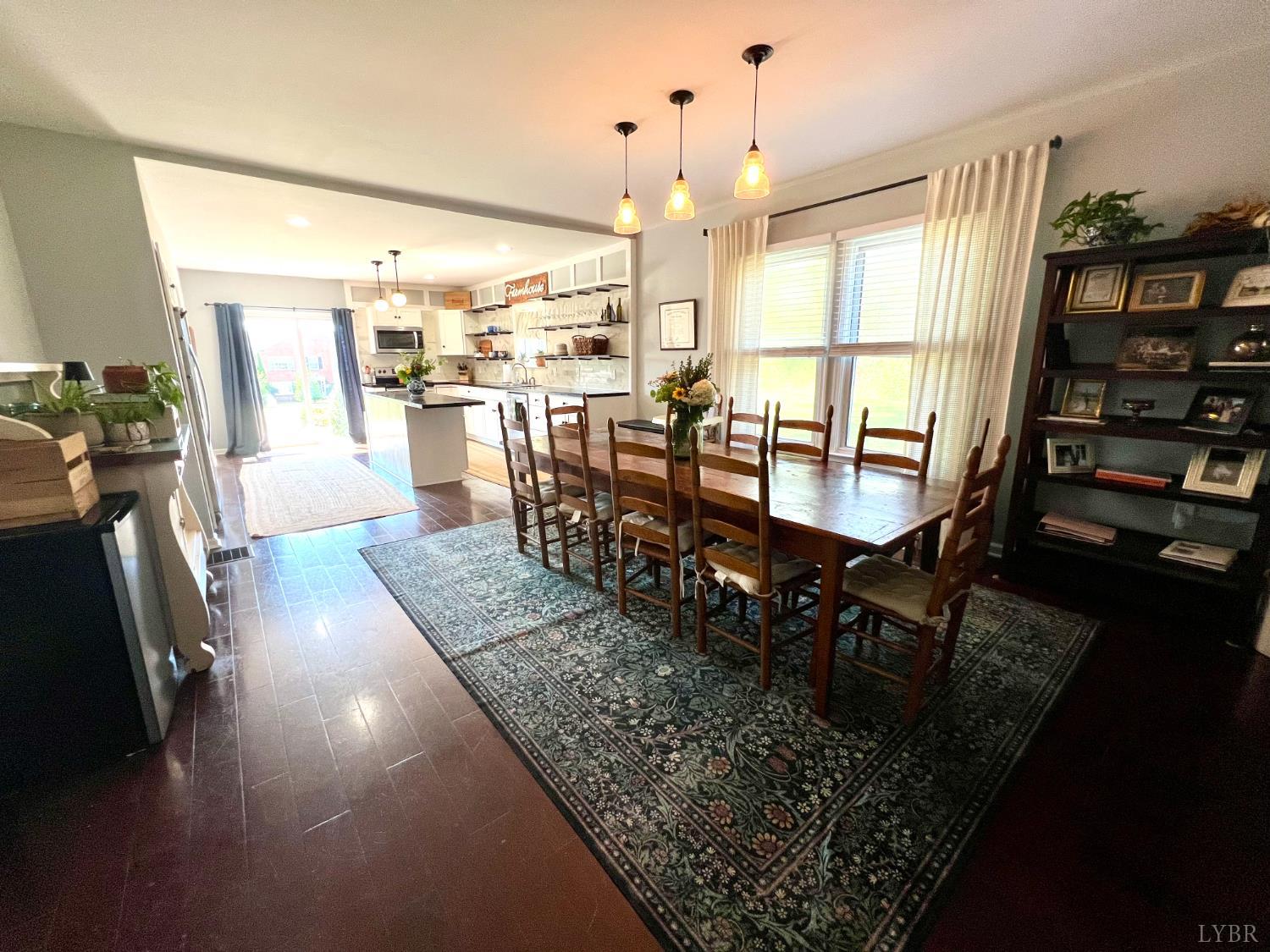 120 North Main Street Amherst, VA 24521 - Photo 18 of 62 a view of a dining room with furniture window and wooden floor