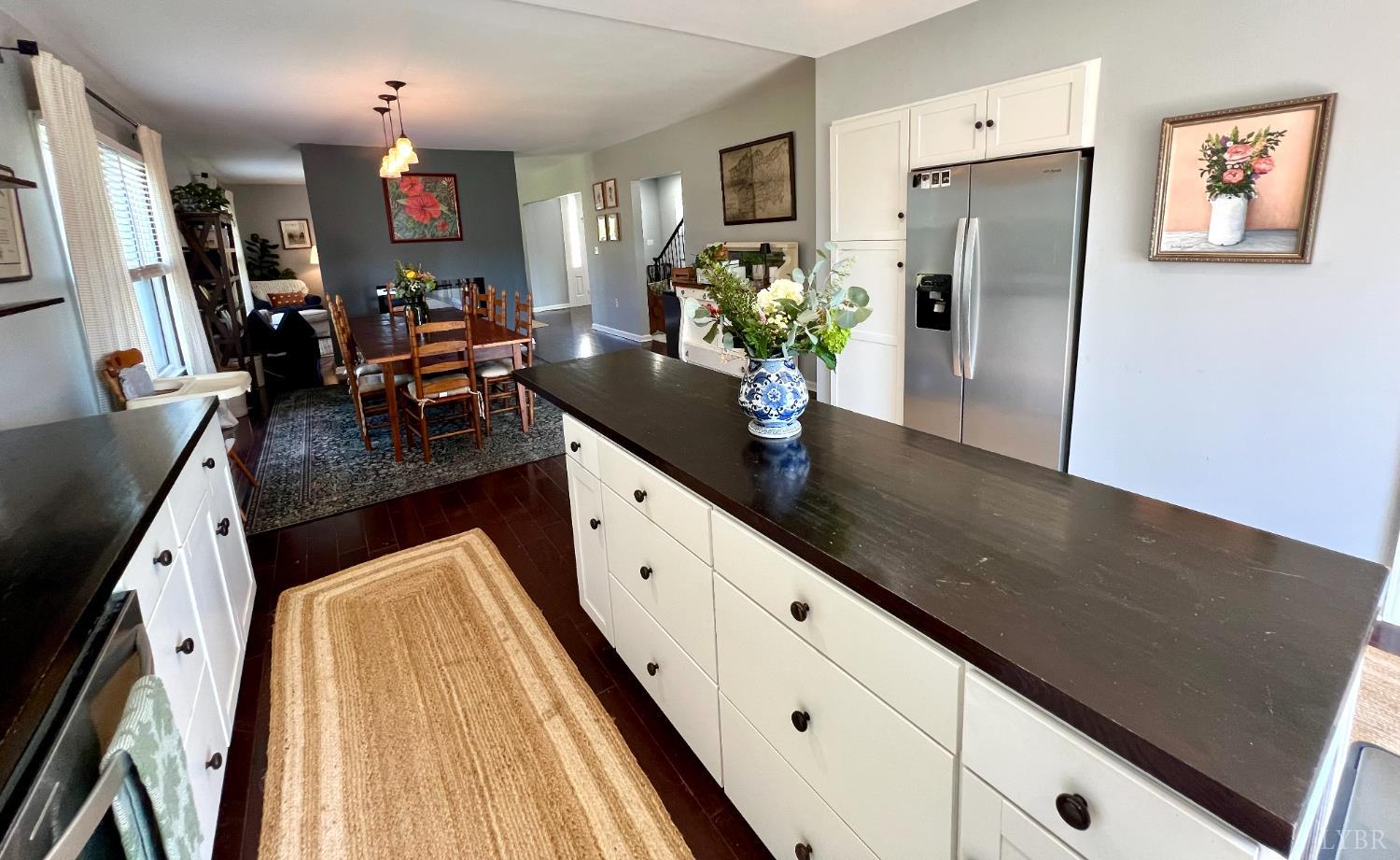 120 North Main Street Amherst, VA 24521 - Photo 24 of 62 a kitchen with stainless steel appliances a counter top space and cabinets