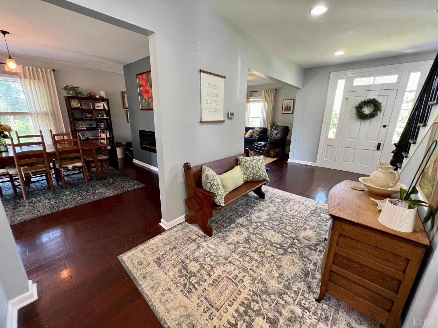 120 North Main Street Amherst, VA 24521 - Photo 25 of 62 a living room with furniture and wooden floor