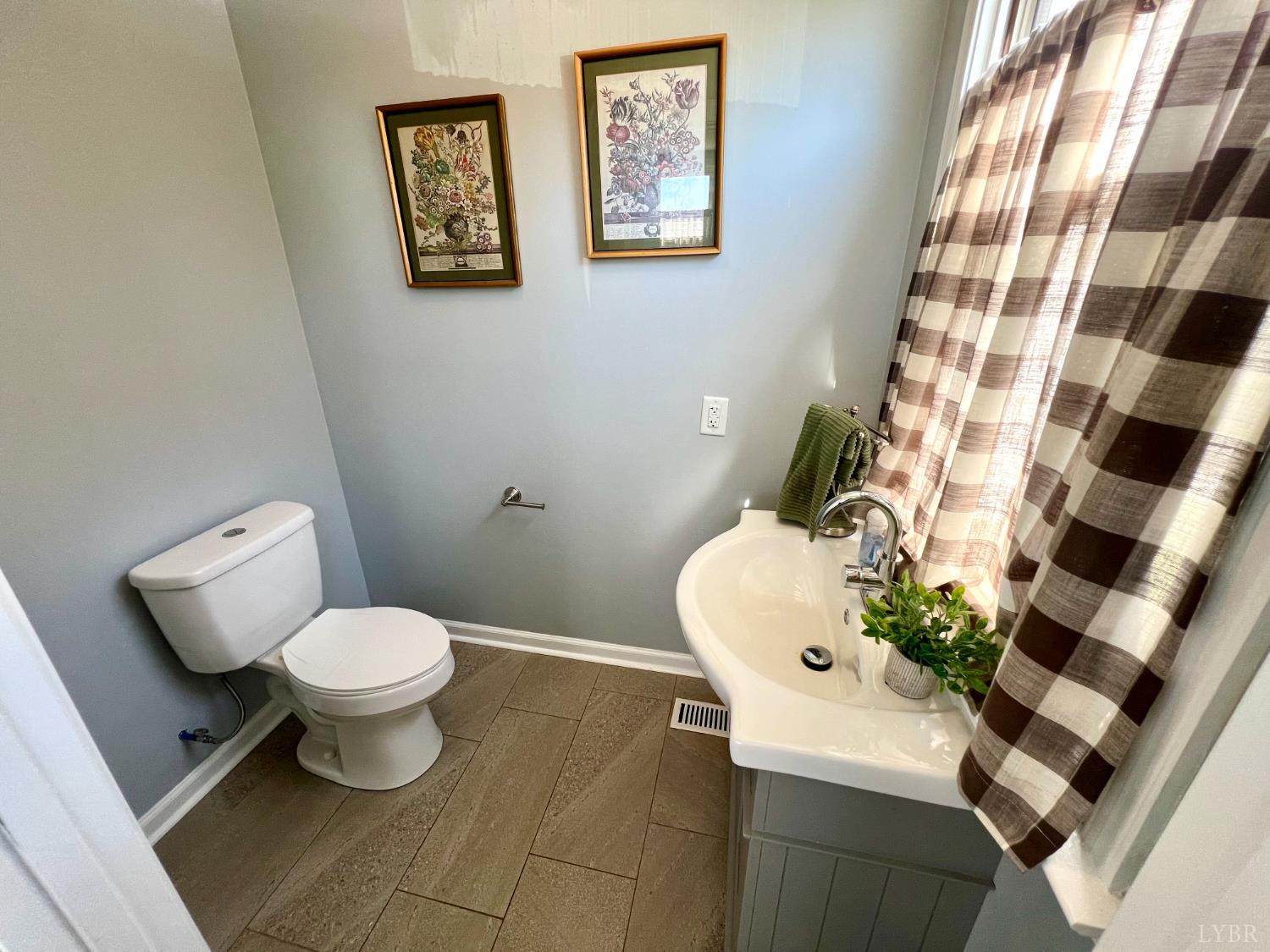 120 North Main Street Amherst, VA 24521 - Photo 32 of 62 a bathroom with a sink toilet and shower