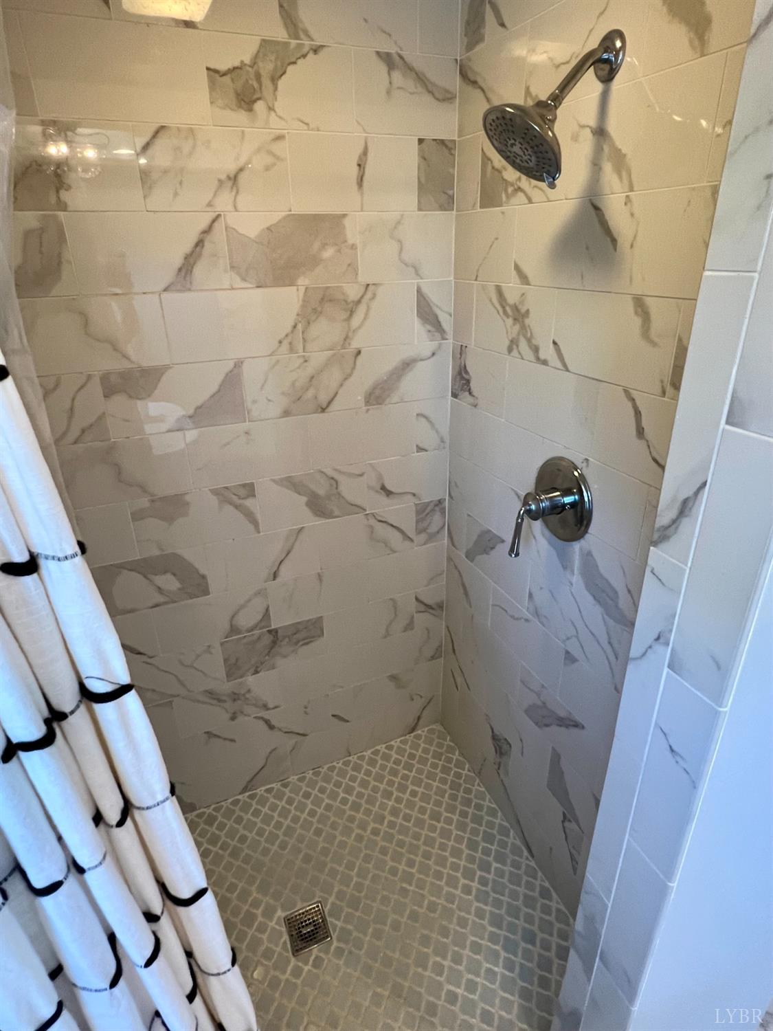 120 North Main Street Amherst, VA 24521 - Photo 36 of 62 a bathroom with a shower