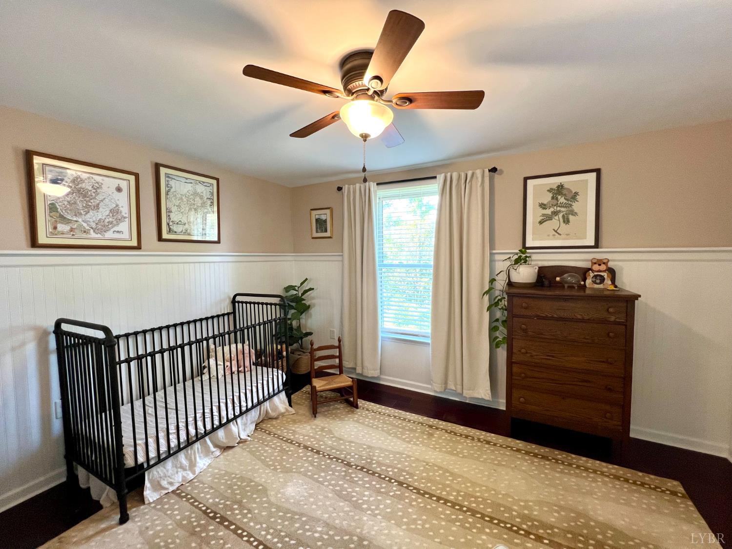 120 North Main Street Amherst, VA 24521 - Photo 41 of 62 a bedroom with a bed and a window