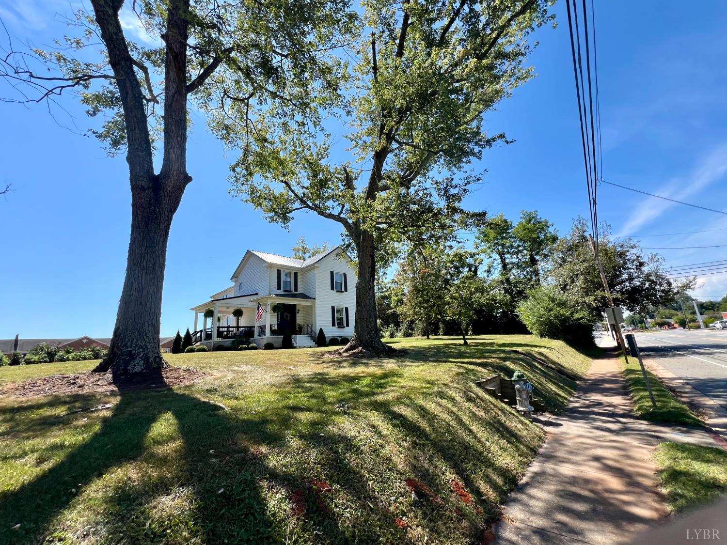 120 North Main Street Amherst, VA 24521 - Photo 57 of 62 a view of a house with a yard