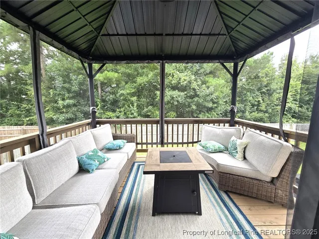 a view of porch with a seating space