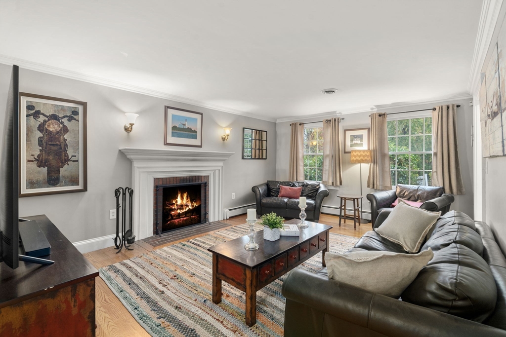 14 Harding Street Medfield, MA 02052 - Photo 12 of 33 a living room with furniture and a fireplace