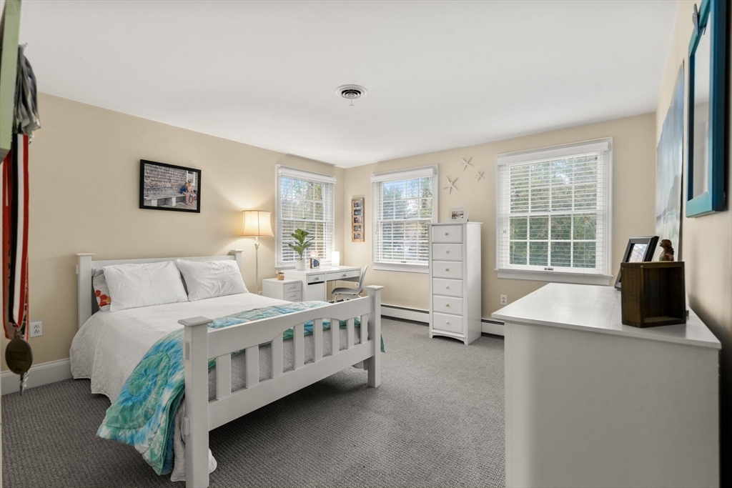 14 Harding Street Medfield, MA 02052 - Photo 20 of 33 a bedroom with a bed dresser and a window