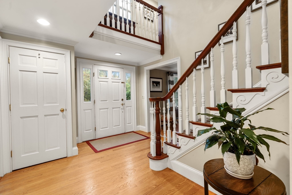 14 Harding Street Medfield, MA 02052 - Photo 2 of 33 a view of entryway with wooden floor and front door