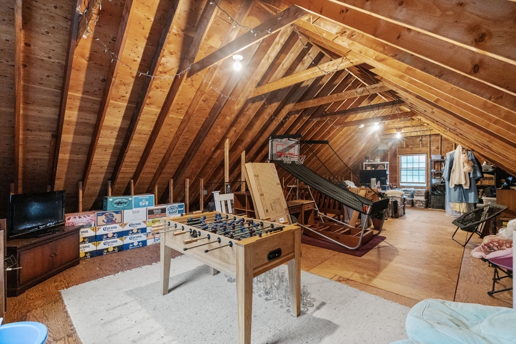 14 Harding Street Medfield, MA 02052 - Photo 23 of 33 a view of a chairs and table in the back yard of the house