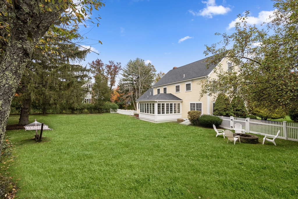 14 Harding Street Medfield, MA 02052 - Photo 30 of 33 a view of a house with a yard porch and sitting area
