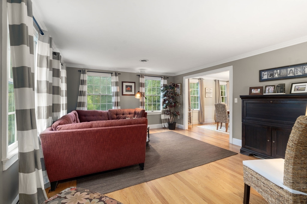 14 Harding Street Medfield, MA 02052 - Photo 4 of 33 a living room with furniture and a fireplace