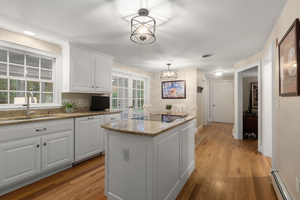 14 Harding Street Medfield, MA 02052 - Photo 7 of 33 a kitchen with granite countertop a sink a counter space appliances and cabinets