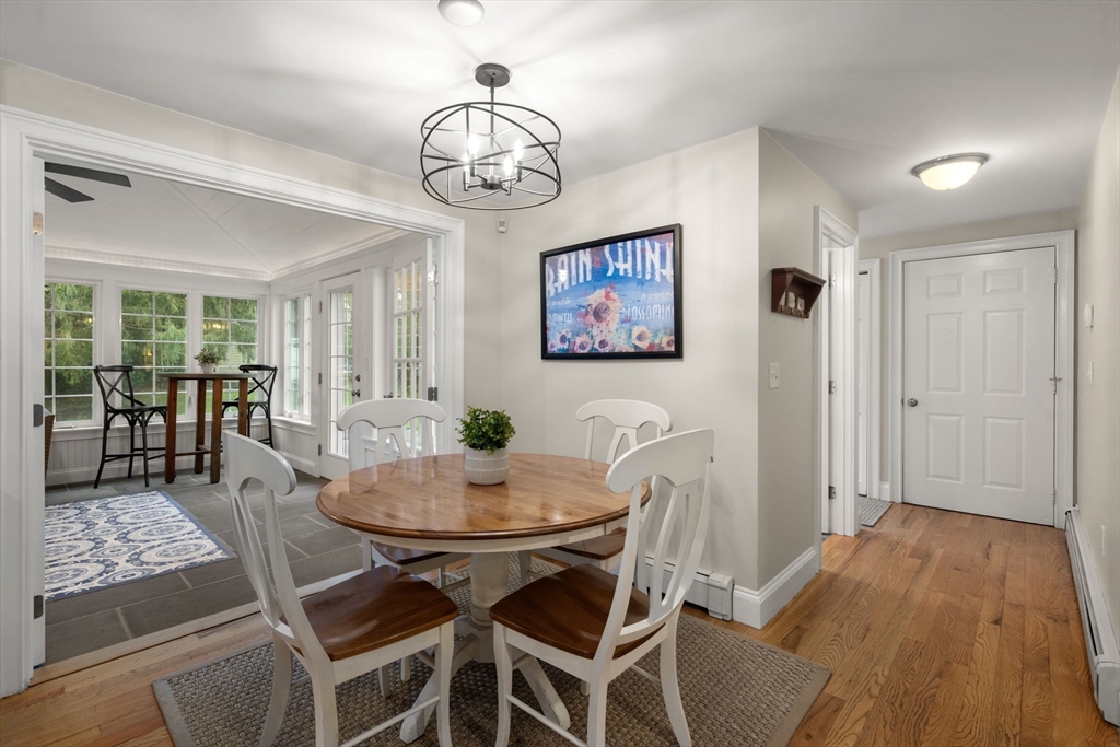14 Harding Street Medfield, MA 02052 - Photo 9 of 33 a view of a dining room with furniture wooden floor and chandelier