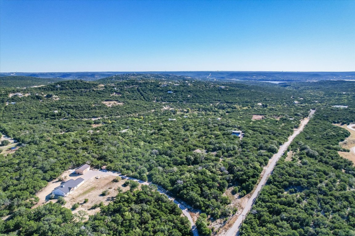 19918 Old Burnet Road Jonestown, TX 78645 - Photo 5 of 11 Aerial view of a heavily wooded area