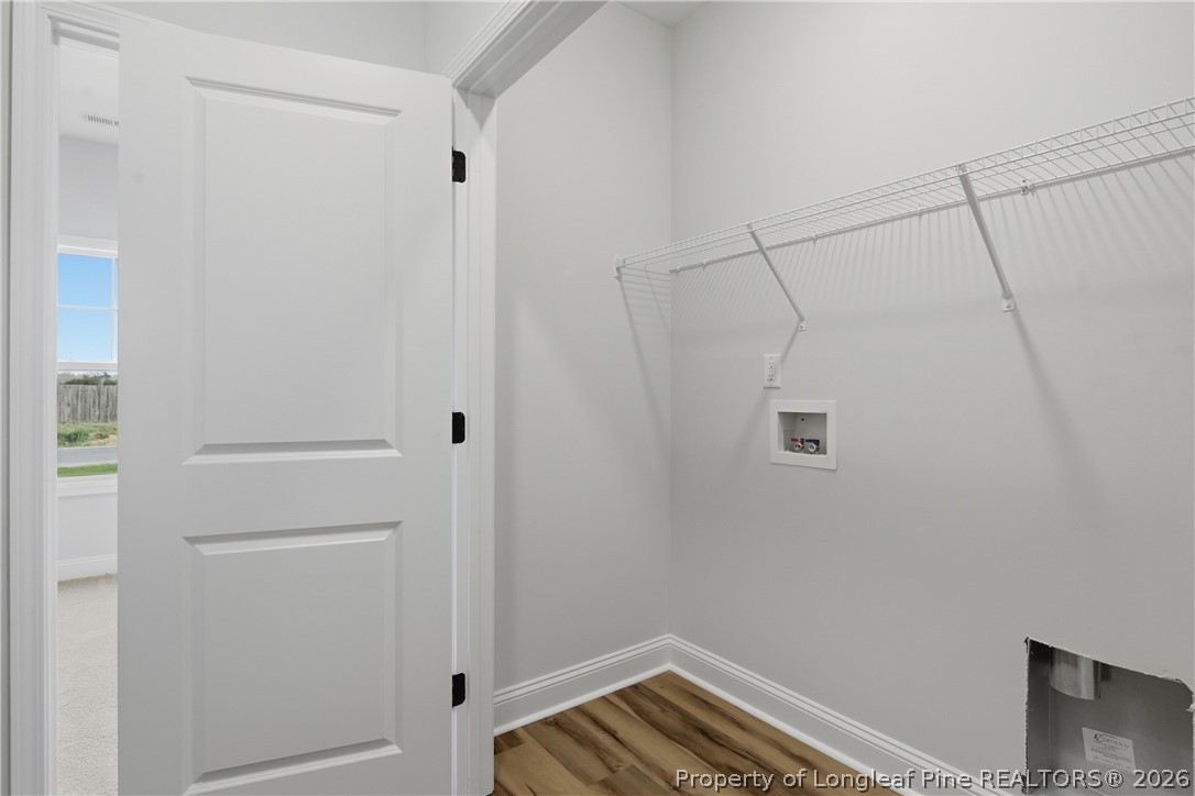 1523 McBryde Lake Road Raeford, NC 28376 - Photo 24 of 32 a view of a room with wooden floor