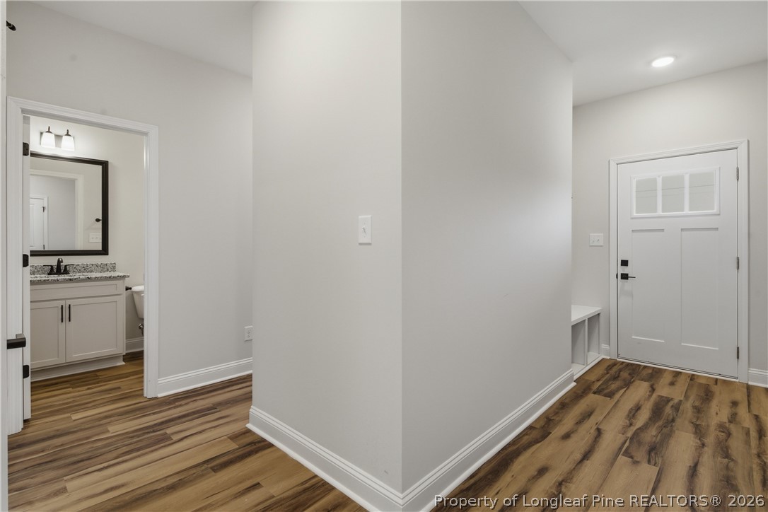 1523 McBryde Lake Road Raeford, NC 28376 - Photo 5 of 32 a view of kitchen and wooden floor