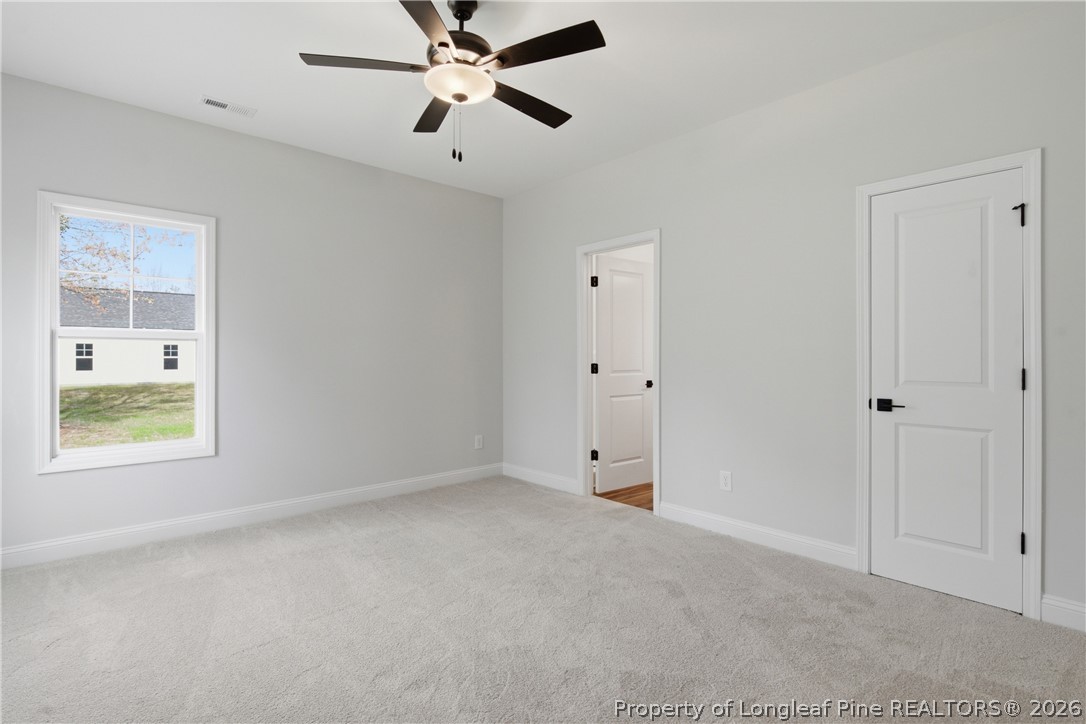 1523 McBryde Lake Road Raeford, NC 28376 - Photo 9 of 32 a view of an empty room with a window