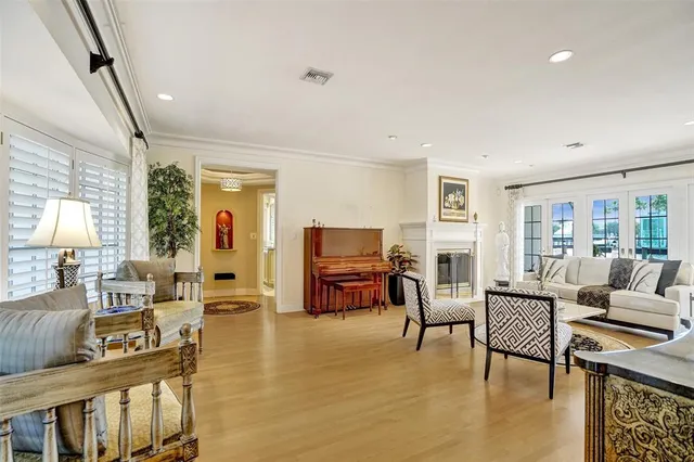 a kitchen with kitchen island a counter top space cabinets stainless steel appliances and a counter top space