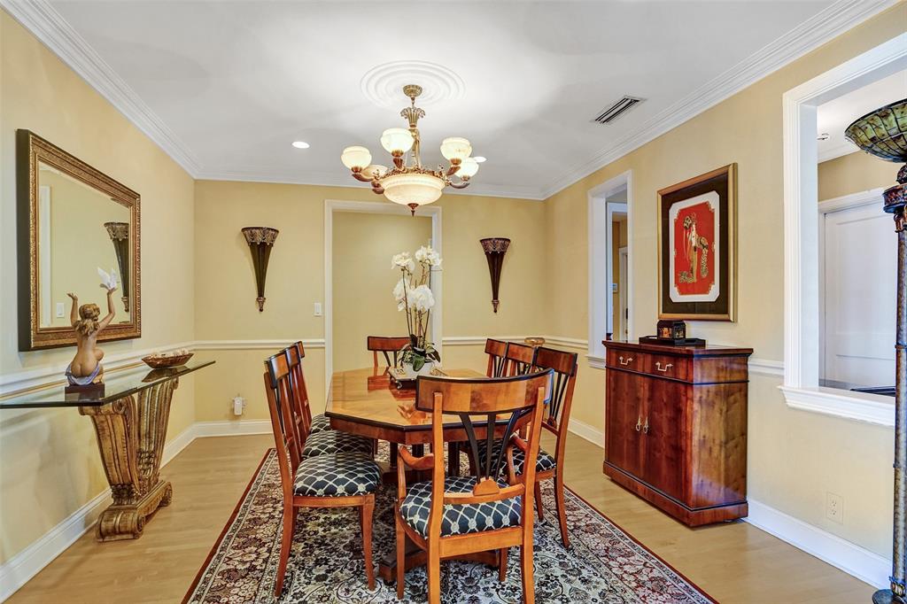 7 Saranac Road Sea Ranch Lakes, FL 33308 - Photo 21 of 93 a view of a dining room with furniture