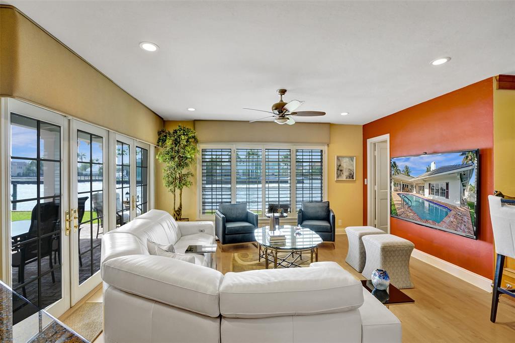 7 Saranac Road Sea Ranch Lakes, FL 33308 - Photo 22 of 93 a living room with furniture and a large window