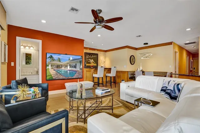 a bath tub sitting in a bathroom next to a window