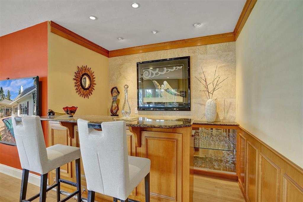 7 Saranac Road Sea Ranch Lakes, FL 33308 - Photo 30 of 93 a view of a dining room with furniture and window
