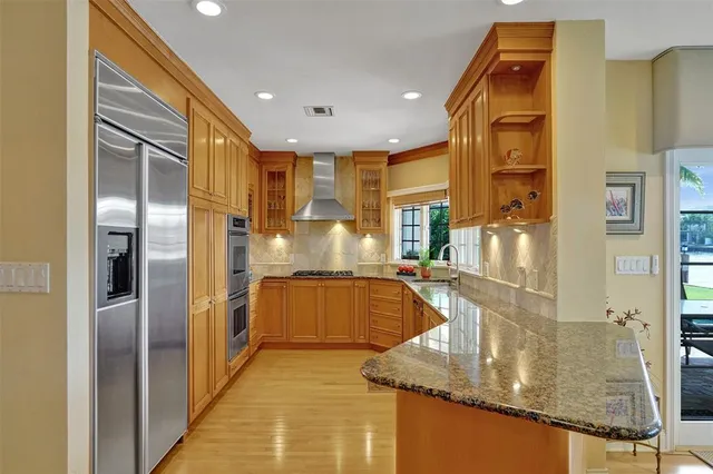 a view of a dining room with furniture and window