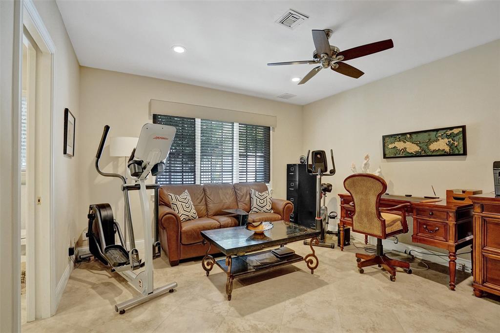 7 Saranac Road Sea Ranch Lakes, FL 33308 - Photo 57 of 93 a living room with furniture gym equipment and a view of living room