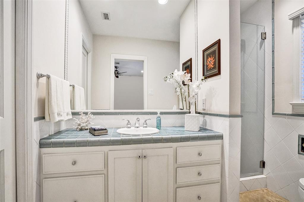 7 Saranac Road Sea Ranch Lakes, FL 33308 - Photo 61 of 93 a bathroom with a granite countertop double vanity sink and a mirror
