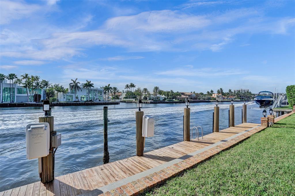 7 Saranac Road Sea Ranch Lakes, FL 33308 - Photo 74 of 93 a view of a garden with sitting area