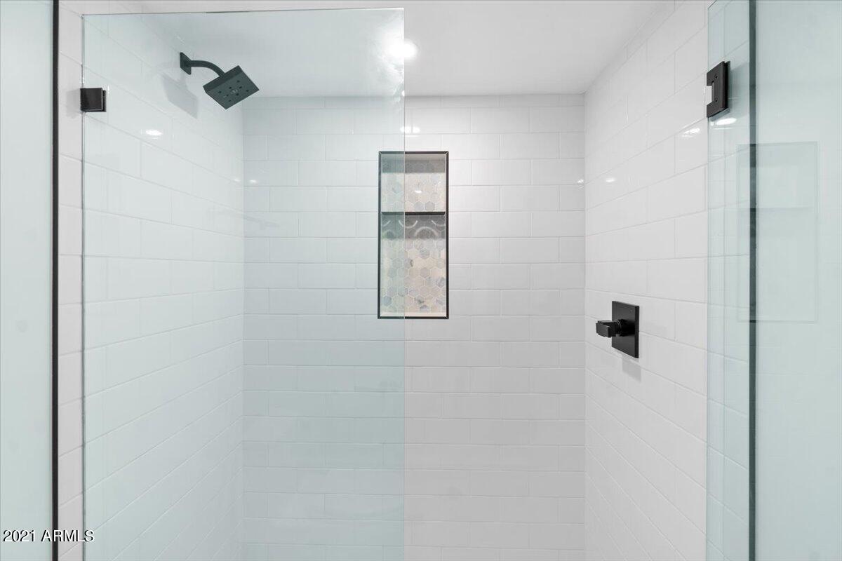 4041 East Camelback Road, Unit 2 Phoenix, AZ 85018 - Photo 16 of 25 a bathroom with a shower