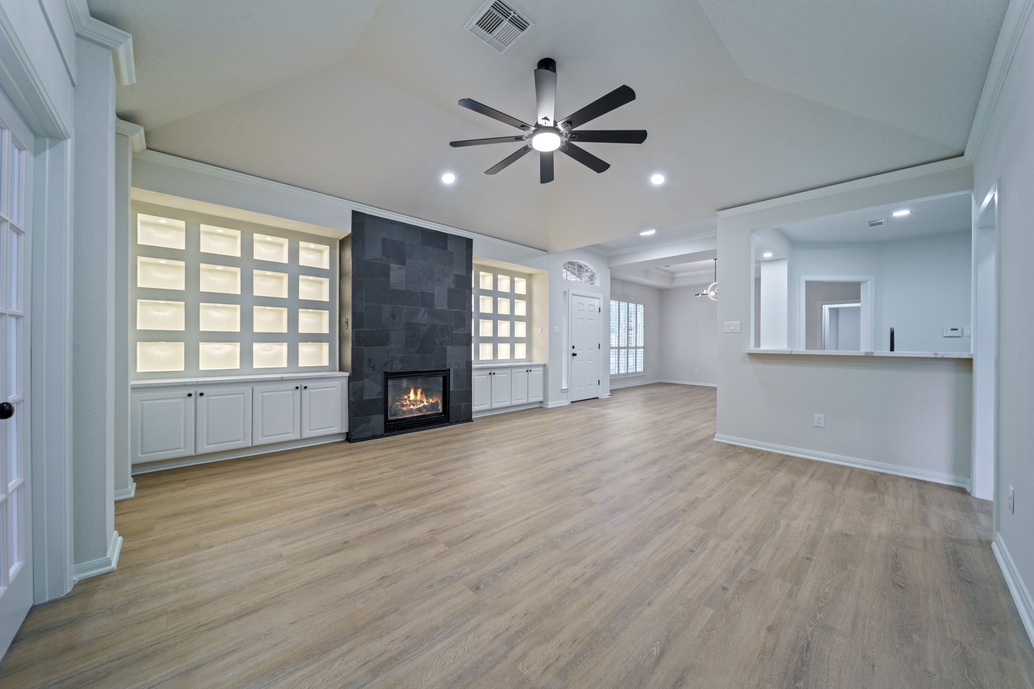 14420 Walters Road, Unit 50 Houston, TX 77014 - Photo 8 of 23 a view of an empty room with window and wooden floor