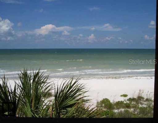 6 Gulf Boulevard, Unit 104 Indian Rocks Beach, FL 33785 - Photo 1 of 1 Exterior Front - Direct gulf front/view from balcony