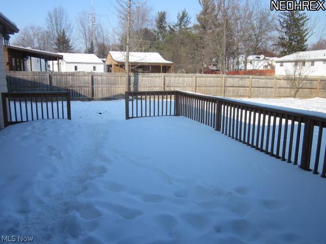 2411 Liberty Road Stow, OH 44224 - Photo 9 of 25 Great deck for entertaining. Terrific fenced back yard, great for pets & privacy!