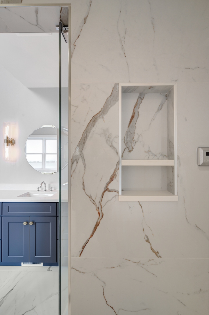 3302 North Hoyne Avenue Chicago, IL 60618 - Photo 14 of 27 a view of staircase with white walls and cabinets